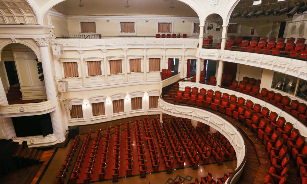 The Ho Chi Minh City Opera House interior features an elegant French colonial design, with intricate balconies, and a grand stage, creating a timeless setting for world-class performances 